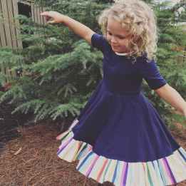 photo of girl wearing half sleeved dress near green leaf plant